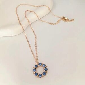 Elegant Blue and Gold Circle Pendant
Necklace with Rhinestones 14K Gold Plated